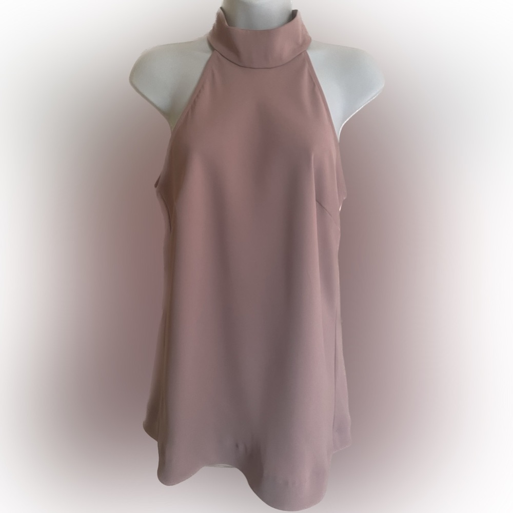 Dusty pink, halter top from Femme. New without tags. Size medium.